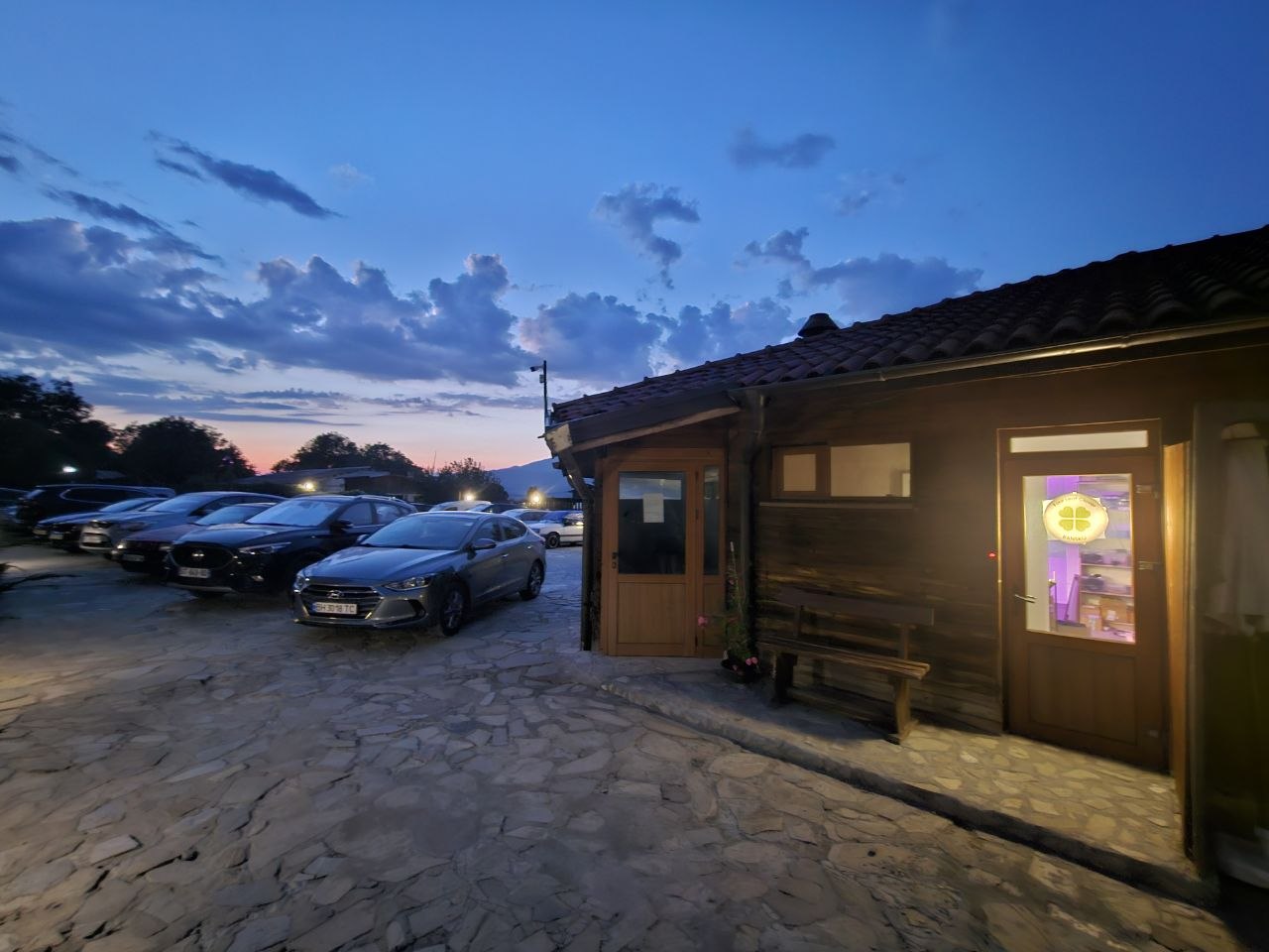 The space from outside, window sign lit